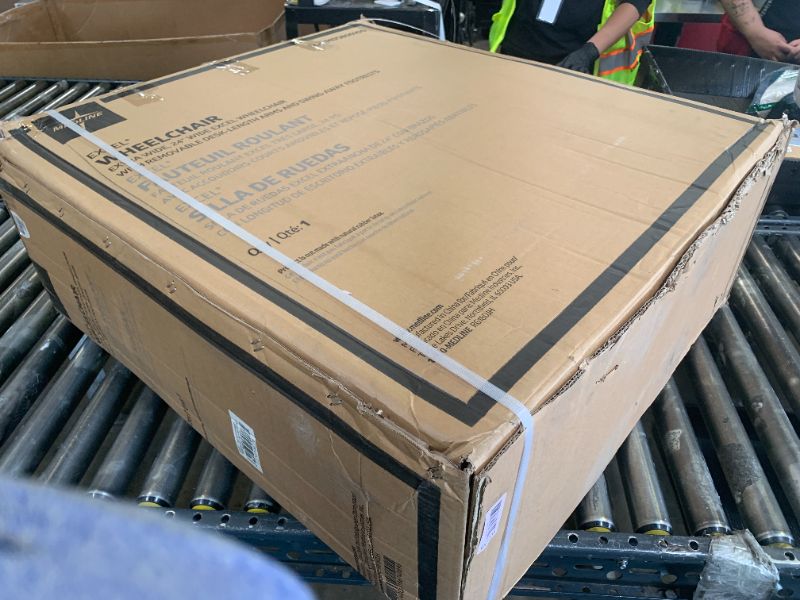 Photo 1 of Medline Durable Steel Wheelchair with Flip-Back Desk-Length Arms, Elevated Leg Rests, 20-Inch Wide Seat, 300-Ib weight capacity, 50.2 Pounds, Black