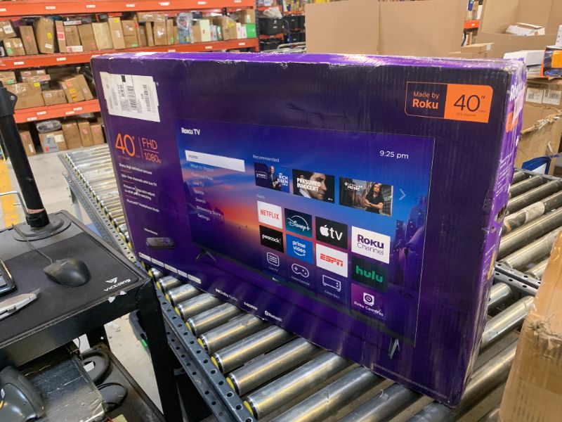 Photo 1 of **MAJOR DAMAGE, SOLD FOR PARTS** Roku Smart TV 2026 – 40-Inch Select Series, 1080p Full HD TV – Roku TV with Voice Remote – Flat Screen LED Television with Wi-Fi for Streaming Live Local News Sports & Movies, Bluetooth Headphone Mode