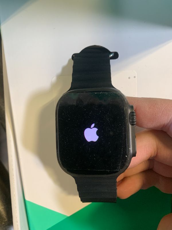 Photo 1 of Apple Watch Ultra 2 (GPS + Cellular, 49MM) - Black Titanium Case with Black Ocean Band (Renewed Premium)