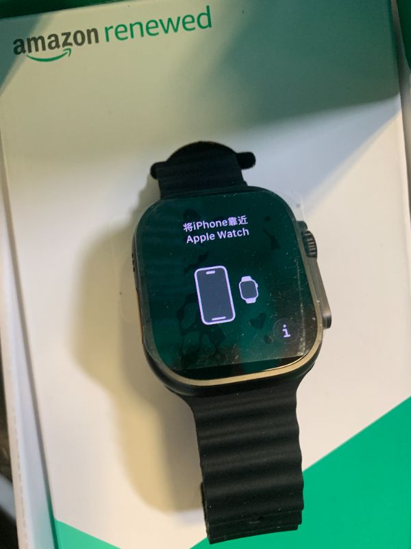 Photo 1 of Apple Watch Ultra 2 (GPS + Cellular, 49MM) - Black Titanium Case with Black Ocean Band (Renewed Premium)