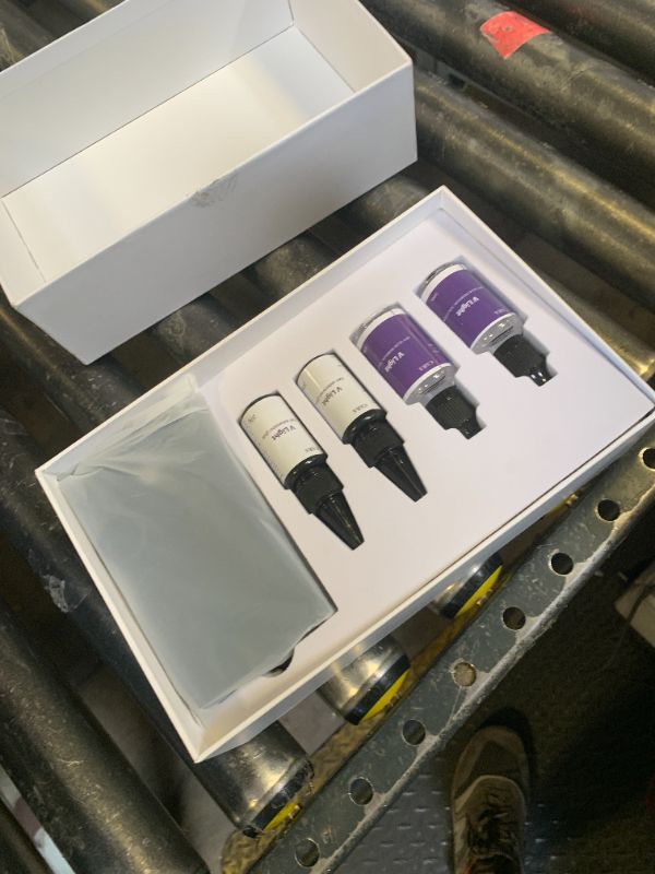 Photo 1 of V Light Hair Extensions Kit V-Light hair Extension Machine*1, Remover Machine*1, UV Glue 20g * 6, Remover Solution 20ml * 4(Black Machine Set)