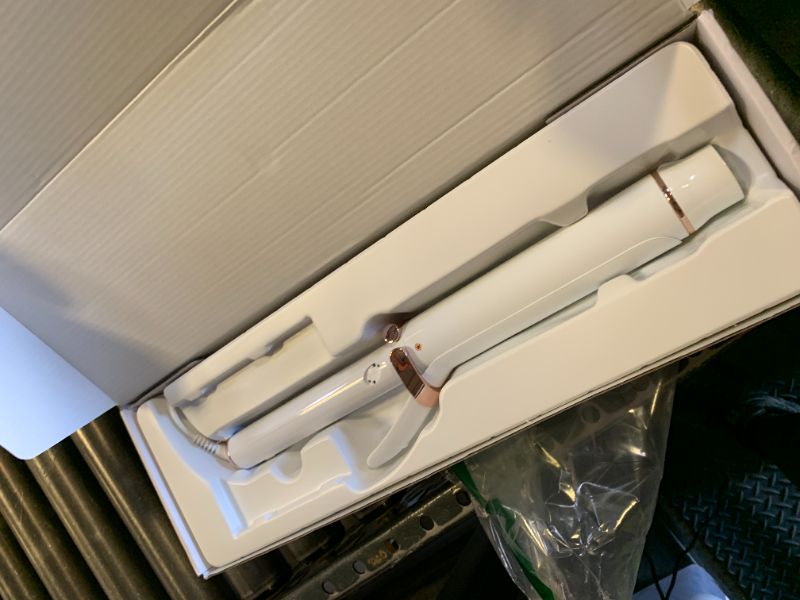 Photo 1 of T3 SinglePass Curl X Extra-Long Barrel Curling Iron with 9 Heat Settings and Ceramic Barrel for Fast Styling and Lasting Results on All Hair Types