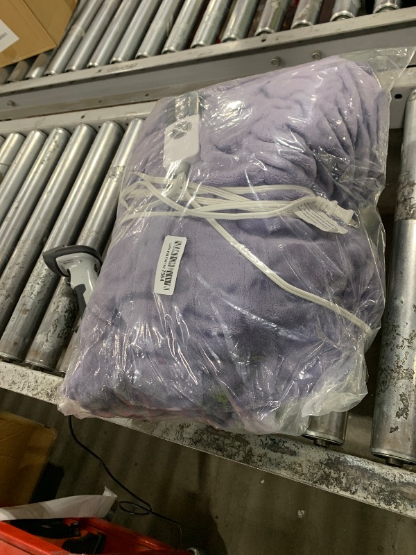 Photo 1 of PURPLE HEATED BLANKET 