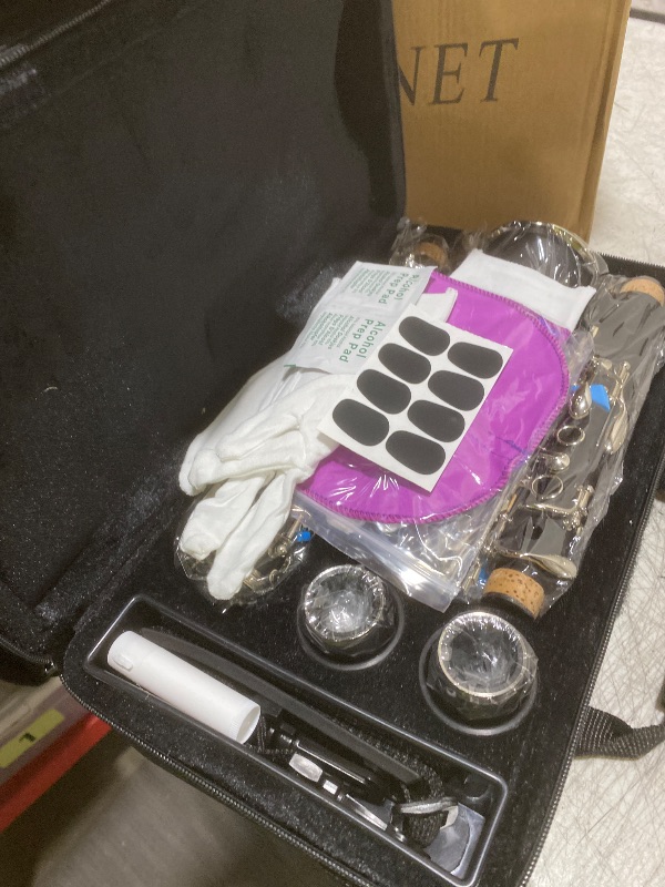 Photo 1 of Bb Clarinet For Beginners Students B Flat Clarinet 17 Keys Clarinets with Case Stand Strap 2 Barrels 8 Mouthpiece Cushion White Gloves Cleaning Kit (Black)