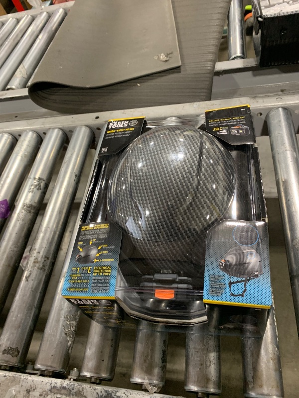 Photo 1 of Safety Helmet, Non-Vented Class E with Rechargeable Lamp and Chin Strap, Premium KARBN Pattern, Tested up to 20kV
