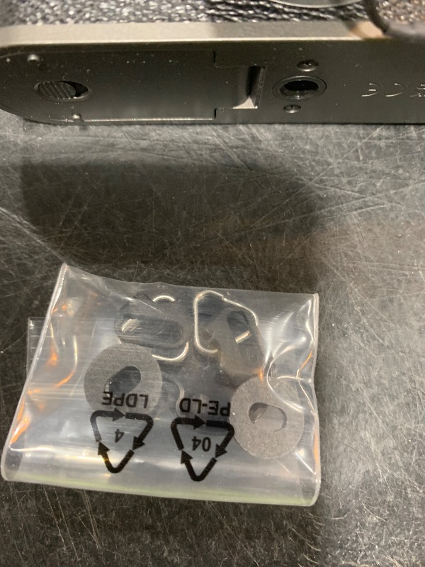 Photo 1 of FUJIFILM X Half Premium Compact Digital Camera (Charcoal Silver) Bundle with Carrying Case + 64GB Memory Card + Lens Cap Keeper + Memory Card Wallet + Hand Strap + More