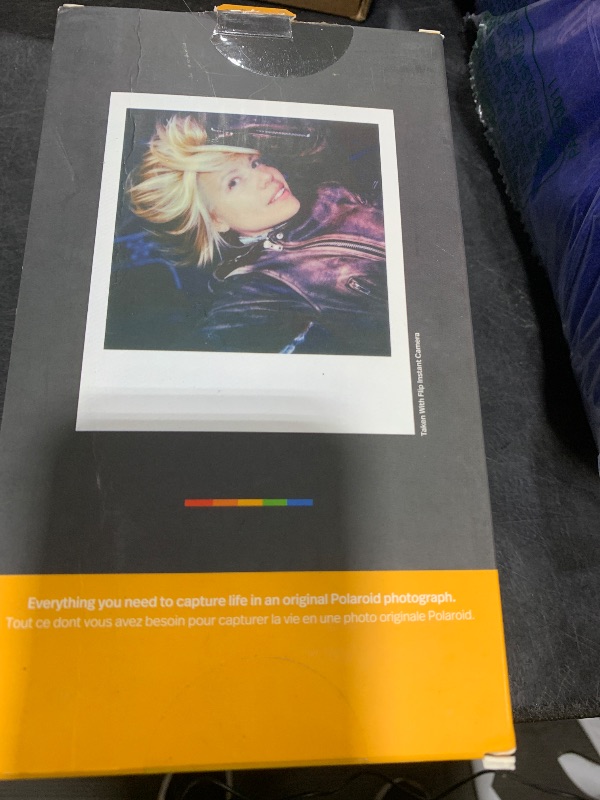 Photo 1 of Polaroid Flip Instant Camera + Color Film Bundle (16 Photos Included) - Black (6565) - Hyperfocal 4-Lens System, Sonar autofocus, and Sence Analysis with Bluetooth paired Companion app