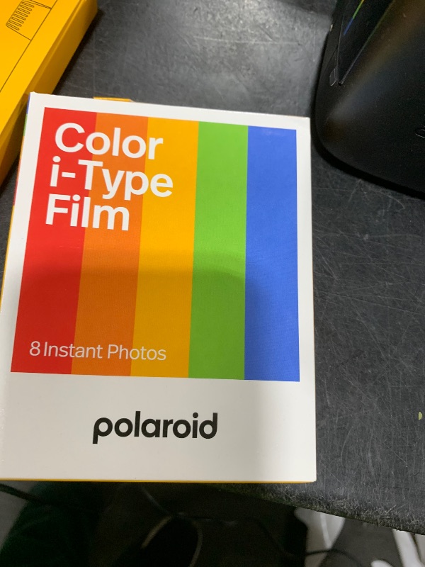Photo 1 of Polaroid Flip Instant Camera + Color Film Bundle (16 Photos Included) - Black (6565) - Hyperfocal 4-Lens System, Sonar autofocus, and Sence Analysis with Bluetooth paired Companion app