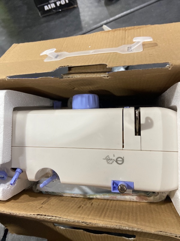 Photo 1 of Stoigeld Sewing Machine for Beginners with 20 Pcs Fabric and 32 Pcs Sewing Threads Kit,Portable Sewing Machine with 12 Built-in Stitches,2 Speed(High-Low Speeds) - White Blue
