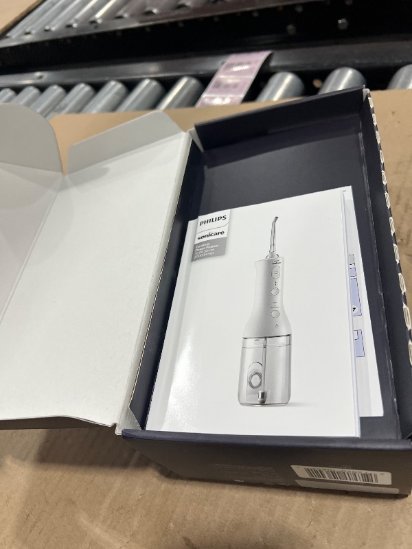 Photo 1 of Philips Sonicare Cordless Power Flosser 3000 - Water Flosser with Innovative Quad Stream Technology, Oral Irrigator with 2 Flossing Modes and 3 Pressure Levels, IPX7 Waterproof, White, HX3826/21
