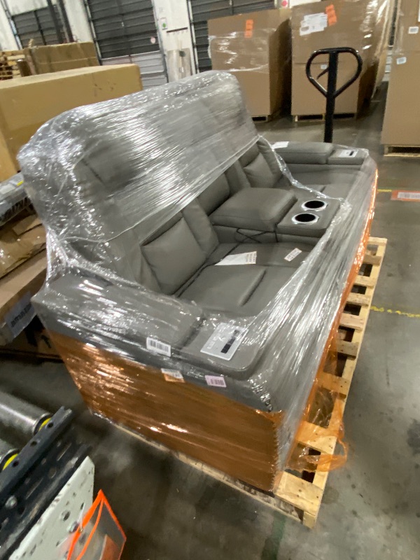 Photo 1 of Signature Design by Ashley The Man-Den Leather Power Reclining Loveseat with Center Console, Adjustable Headrest & Wireless Charging, Gray