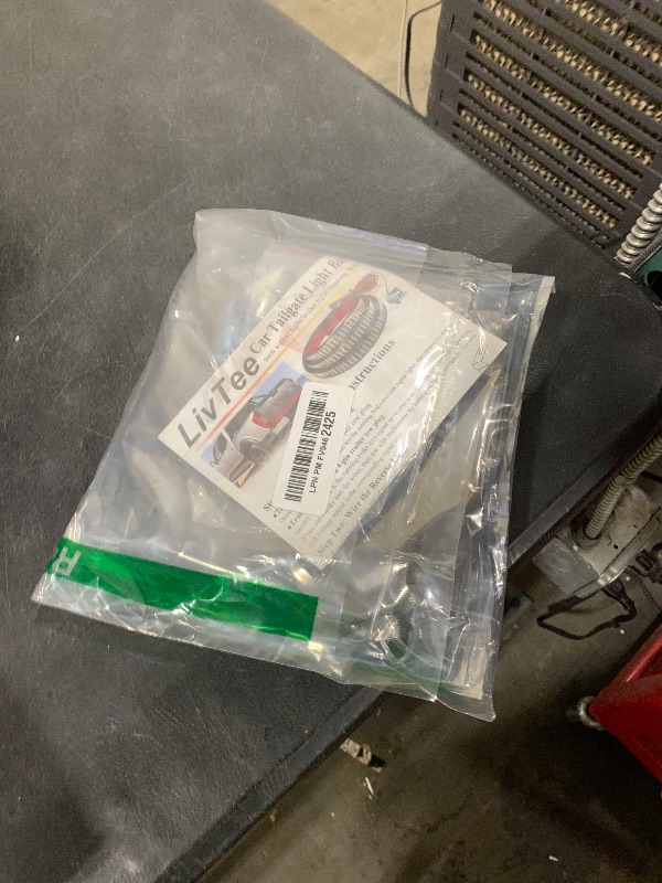 Photo 1 of **SELLING FOR PARTS**Livtee Truck Tailgate Light Bar, 60" Triple Row LED Brake Light Strip with Red Brake/White Reverse/Sequential Amber Turning Signals, Light Bars for Trucks, Truck Accessories for Men- IP68 Waterproof