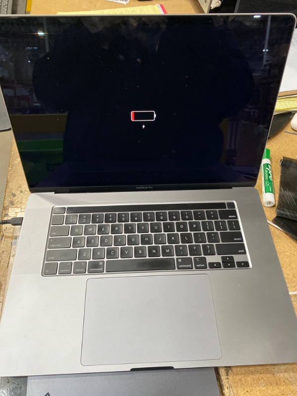 Photo 1 of *** SEE NOTES , MISSING CHARGER ***Apple Late 2019 MacBook Pro with 2.3GHz Intel Core i9 (16-inch, 32GB RAM, 1TB SSD) Space Gray (Renewed)