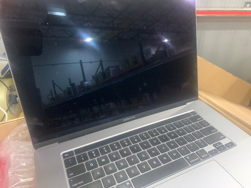 Photo 1 of *** SEE NOTES , MISSING CHARGER ***Apple Late 2019 MacBook Pro with 2.3GHz Intel Core i9 (16-inch, 32GB RAM, 1TB SSD) Space Gray (Renewed)
