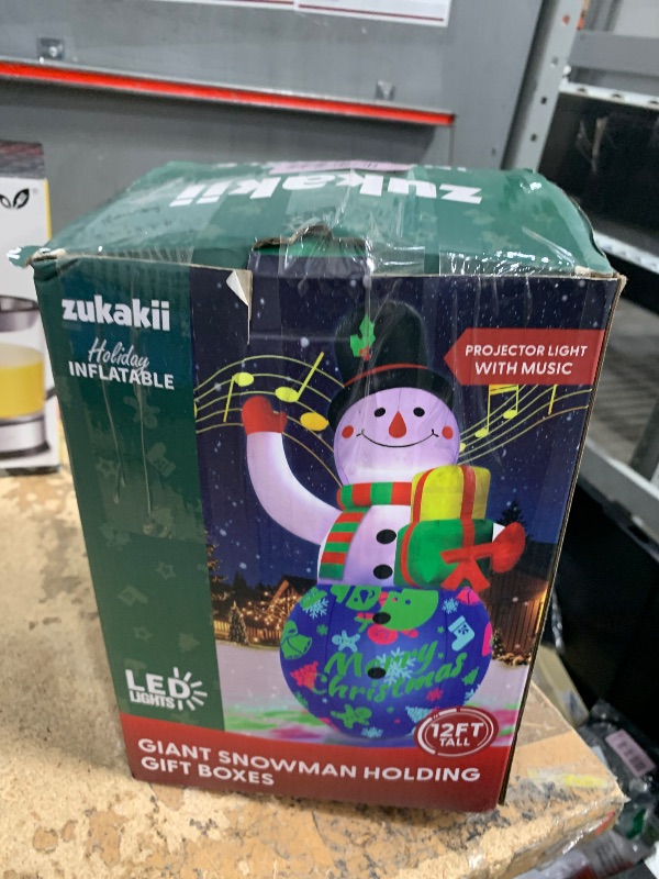 Photo 1 of 12FT Giant Christmas Inflatables Snowman Decorations Built-in Music Box & 360° Rotation 3-Colored LEDs Huge Christmas Inflatable Large Tall Snowman Christmas Blow Ups Decoration Outdoor Xmas New Year