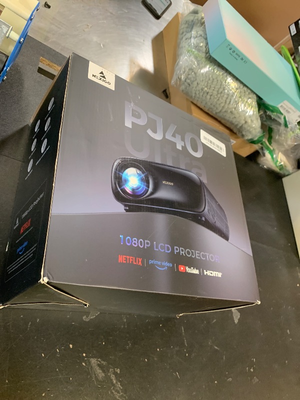 Photo 1 of NexiGo PJ40 Ultra Outdoor Projector, Compatible with Netflix/YouTube/Prime Video, 800 ANSI Lumens, AI Image Enhancement, Native 1080p Video Projector, 20W Speaker, Auto Keystone