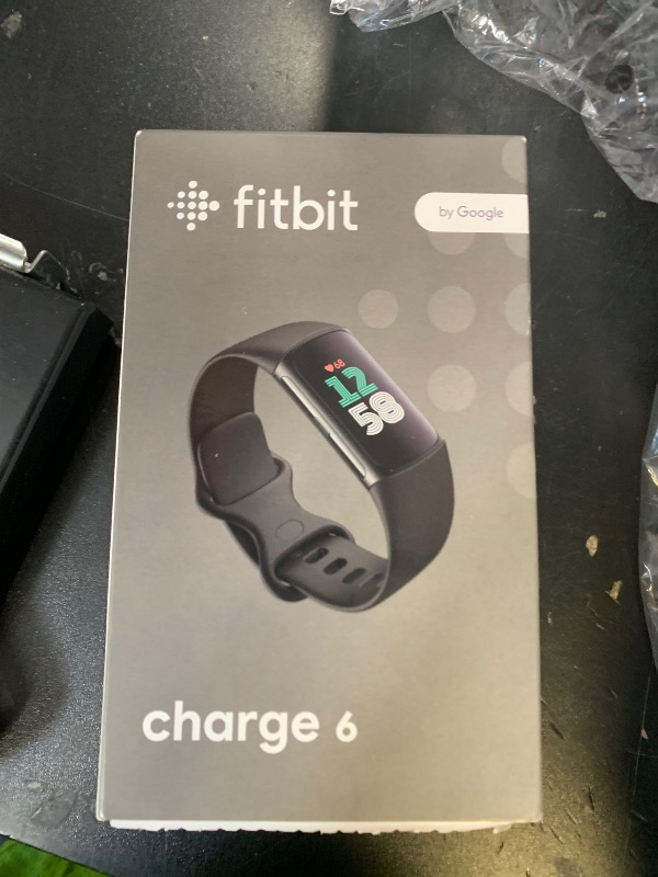 Photo 1 of Fitbit Charge 6 Fitness Tracker with Google apps, Heart Rate on Exercise Equipment, 6-Months Premium Membership Included, GPS, Health Tools and More, Obsidian/Black, One Size (S & L Bands Included)
