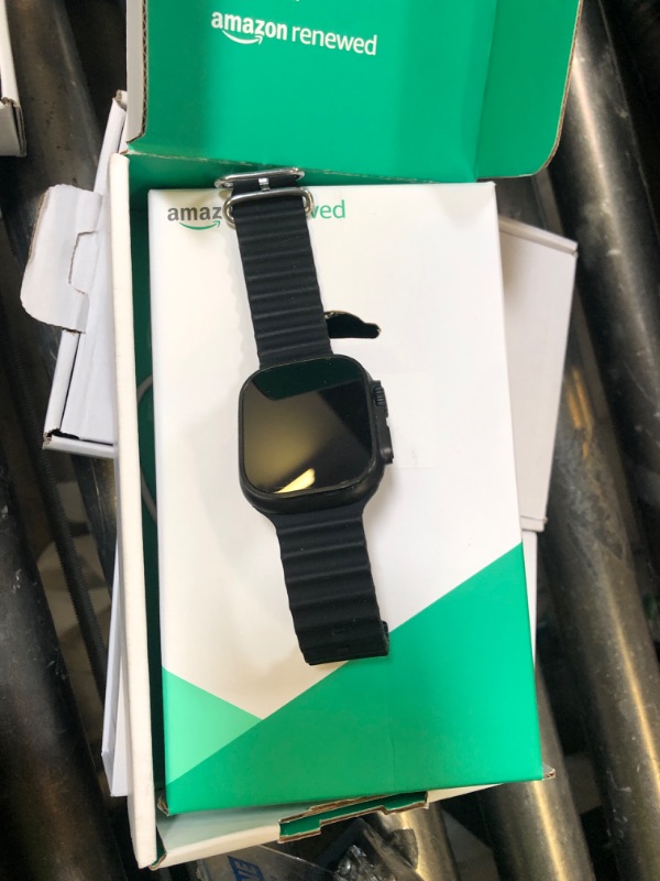 Photo 1 of Apple Watch Ultra 2 (GPS + Cellular, 49MM) - Black Titanium Case with Black Ocean Band (Renewed Premium)