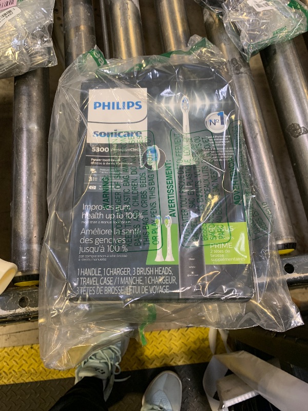 Photo 1 of Philips Sonicare ProtectiveClean 5300 Rechargeable Electric Toothbrush, with Pressure Sensor, 3 Cleaning Modes, SmarTimer and QuadPacer, with 2 Bonus Brush Heads, Travel Case, Black, Model HX6423/34