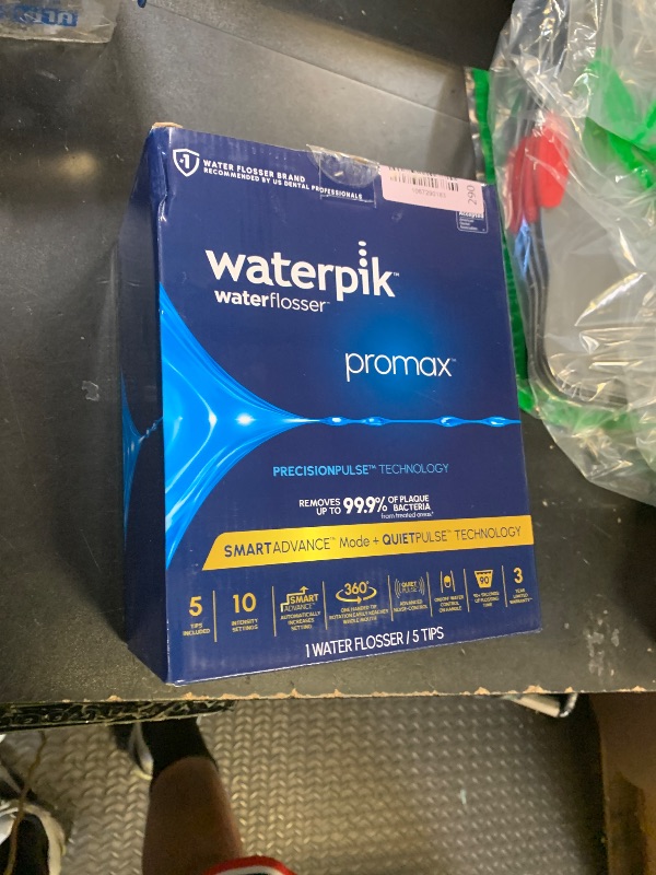 Photo 1 of Waterpik Promax Water Flosser with SmartAdvance Mode for Daily Gum Health and Cleaning Teeth, Braces, Implants, ADA Accepted, Small Quiet Design, Electric Flosser with 10 Settings, 5 Tips, WF-23