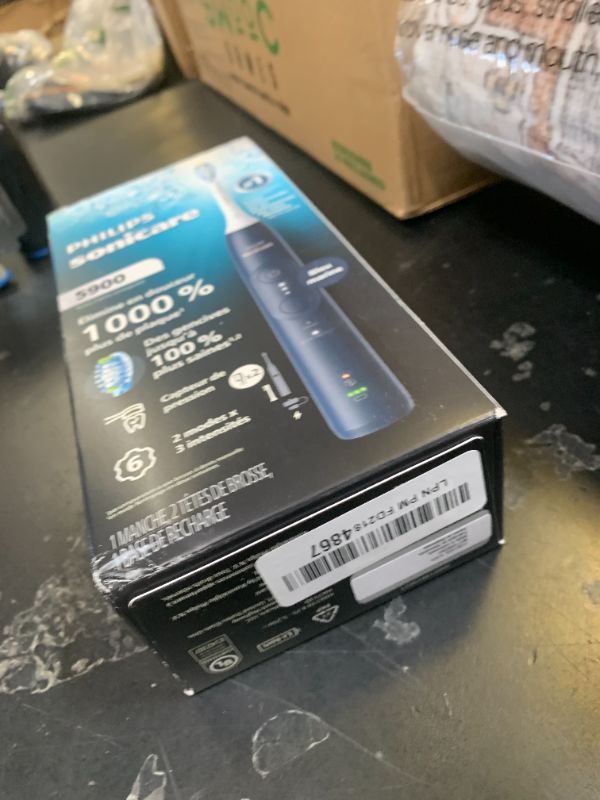 Photo 1 of Philips Sonicare 5900 Series Electric Toothbrush - Next-Generation Sonicare Technology, Pressure Sensor, 6 Brushing Settings, SmarTimer, BrushPacer, 21-Day Runtime, Navy Blue, Model HX7133/02