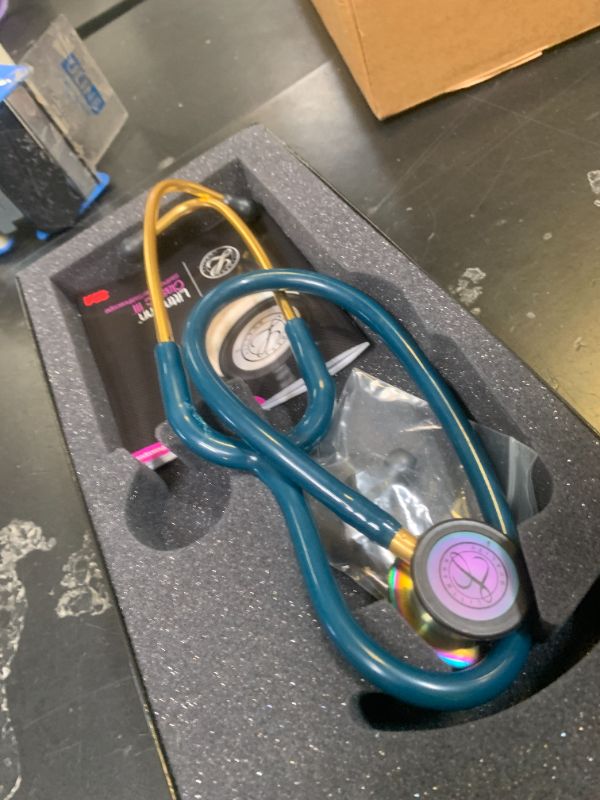 Photo 1 of **Used** 3m tmann Classic III Monitoring Stethoscope, 5807, More Than 2X as Loud, Weighs Less, Stainless Steel Rainbow-Finish Chestpiece, 27" Caribbean Blue Tube, Brass Stem and Headset