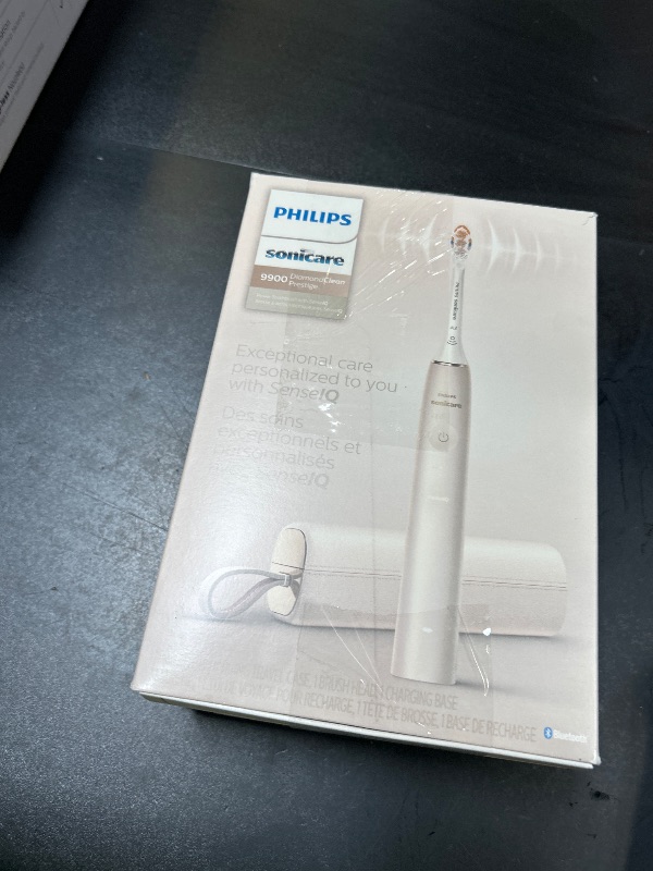 Photo 1 of Philips Sonicare DiamondClean 9900 Prestige Electric Toothbrush - with SenseIQ Technology and Advanced AI App, 5 Brushing Modes, 3 Intensity Levels, Charging Travel Case, Champagne, HX9990/11