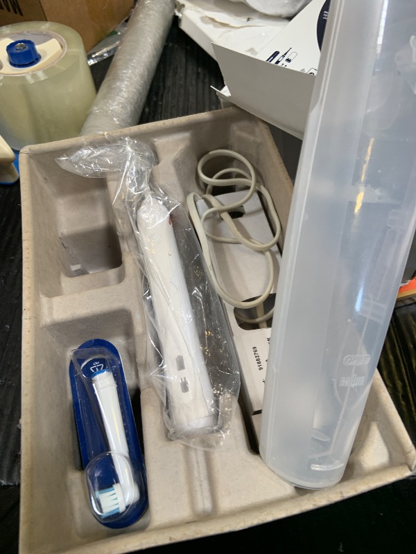 Photo 1 of Oral-B Rechargeable Electric Toothbrush, iO5 Limited Deep Clean & Whiten, 5 Cleaning Modes, Visual Pressure Sensor to Protect Gums, Travel Case, 3 Brush Heads, Black