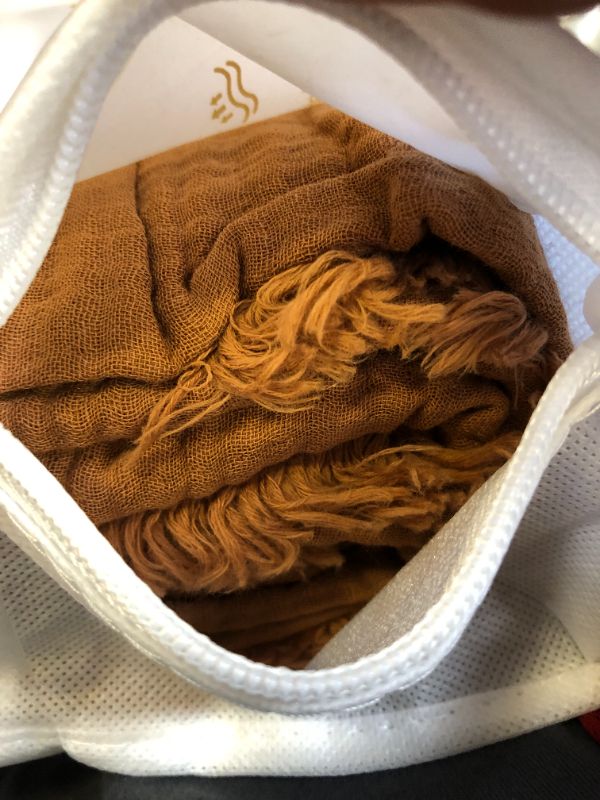 Photo 1 of FOSSA Muslin Blanket with Fringe - 4-Layer 100% Cotton Gauze Super Soft & Breathable Throw -Lightweight Decorative Cooling Blanket for Bed, Sofa, Office -Twin XL Size 66" × 90" (Dark Orange)