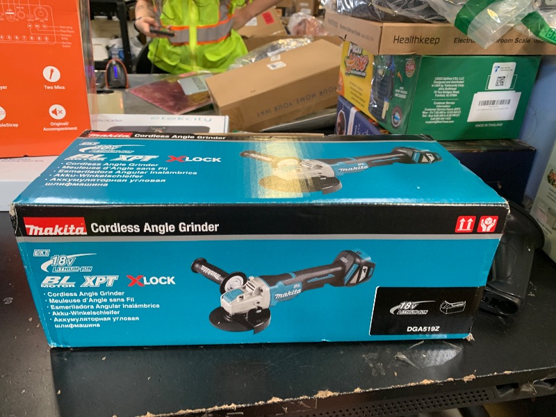 Photo 1 of Makita DGA519Z 18V Li-ion LXT 125mm Brushless X-Lock Angle Grinder - Batteries and Charger Not Included