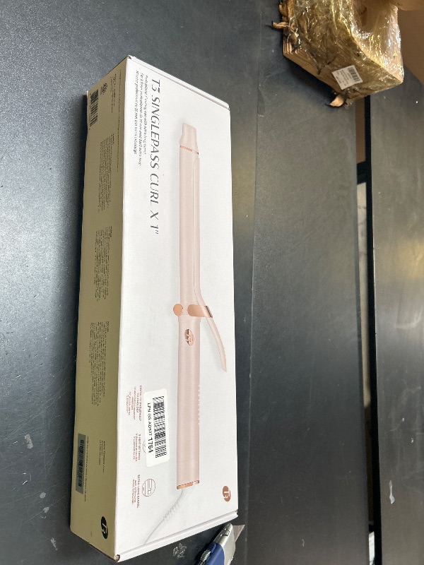 Photo 1 of T3 SinglePass Curl X Extra-Long Barrel Curling Iron with 9 Heat Settings and Ceramic Barrel for Fast Styling and Lasting Results on All Hair Types