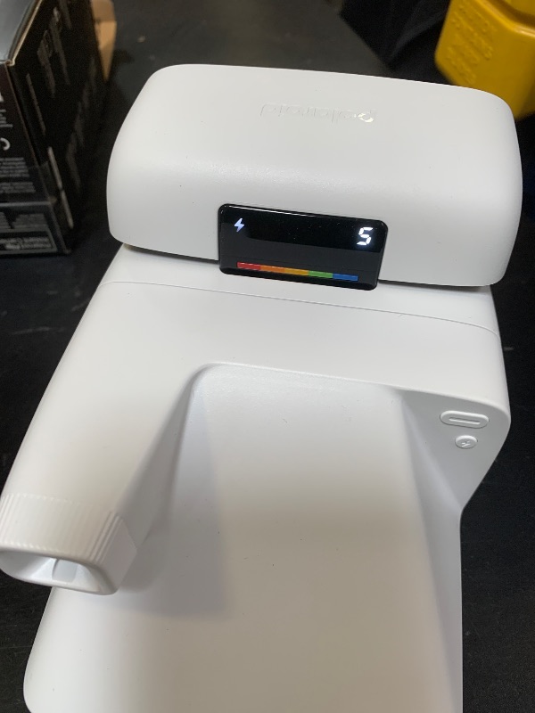 Photo 1 of Polaroid Flip Instant Camera + Color Film Bundle (16 Photos Included) - White (6652) - Hyperfocal 4-Lens System, Sonar autofocus, and Sence Analysis with Bluetooth paired Companion app