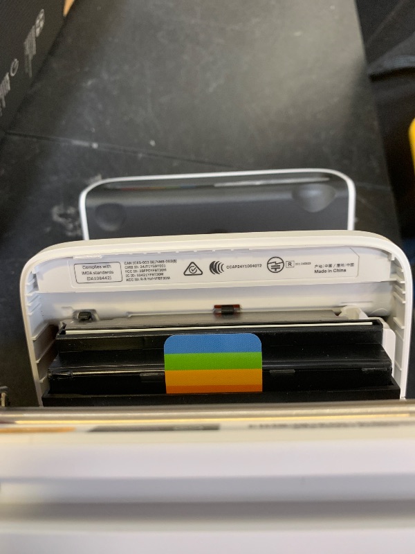 Photo 1 of Polaroid Flip Instant Camera + Color Film Bundle (16 Photos Included) - White (6652) - Hyperfocal 4-Lens System, Sonar autofocus, and Sence Analysis with Bluetooth paired Companion app
