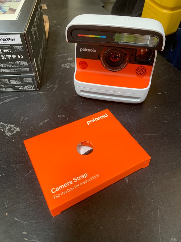 Photo 1 of Polaroid Flip Instant Camera + Color Film Bundle (16 Photos Included) - White (6652) - Hyperfocal 4-Lens System, Sonar autofocus, and Sence Analysis with Bluetooth paired Companion app