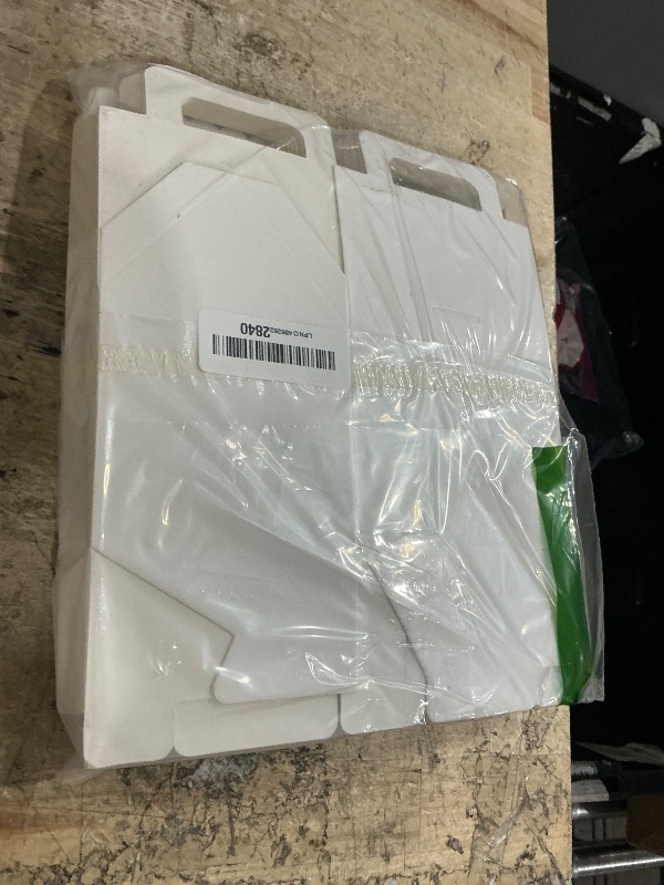 Photo 1 of Dog Party Favors Boxes House Shape Treat Gift Boxes with Handle for Puppy Pet Adoption Kid Boys Girls DIY Crafting Baby Shower Decoration Birthday Christmas Dog Bone Paw Shaped Hollow-out Cute Style White