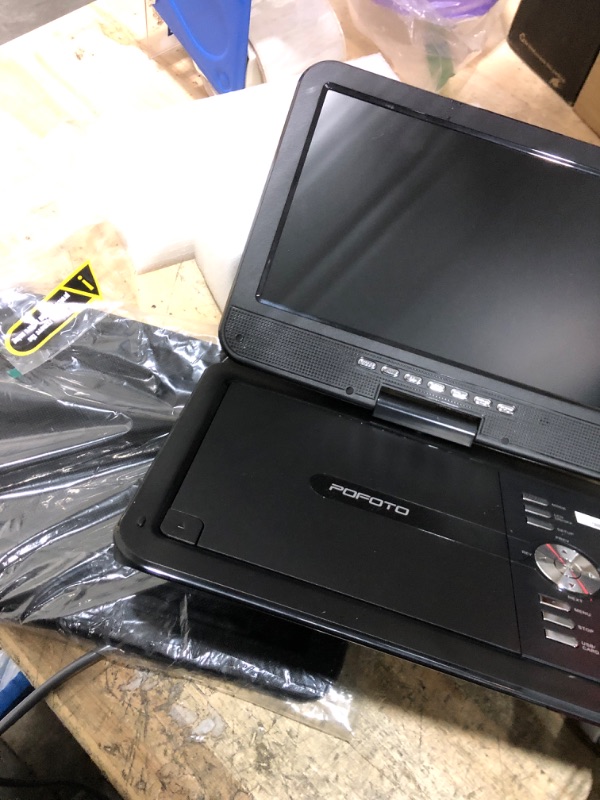 Photo 1 of POFOTO 12.5" Portable DVD Player with 10.5" HD Swivel Screen, 6-Hour Battery Life, Car DVD Player with Dual Speakers, Supports CD/DVD/USB/SD Card, Include Car Headrest Mount and Remote Control