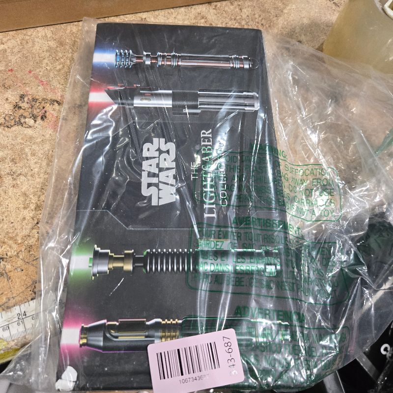 Photo 1 of ***BOOK DAMAGED / WRITTEN IN AND 1 PAGE IS RIPPED ON THE BOTTOM INNER SPINE CORNER*** Star Wars: The High Republic: The Lightsaber Collection