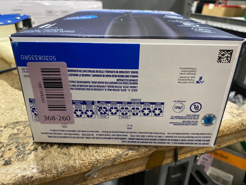 Photo 1 of **DOESNT CHARGE** Oral-B Rechargeable Electric Toothbrush, iO Limited Simple Clean, 3 Cleaning Modes, Automatic Pressure Sensor to Protect Gums, Travel Case, Night Black