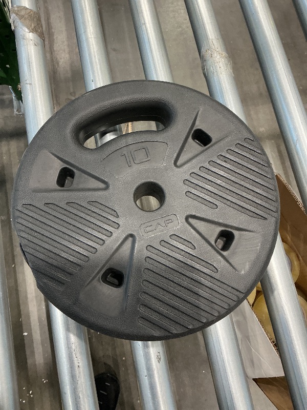 Photo 1 of 10 pound plastic coated weight plate