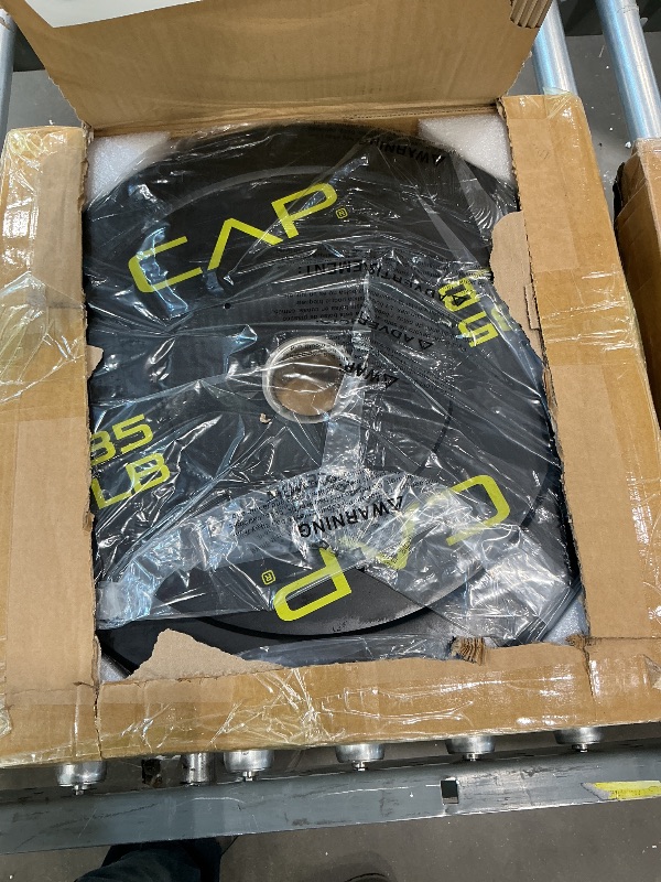 Photo 1 of *PARTIAL SET*
CAP Barbell 260 LB Economy Olympic Bumper Plate Set with Color Logo | Black