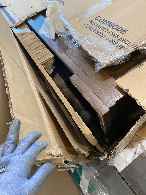 Photo 1 of **USED*Signature Design by Ashley Taffenbrook Farmhouse 10-Drawer Bedroom Dresser with Felt-Lined Top Drawer for Jewelry and Delicates, Easy Glide Drawers, Picture Frame Moulding, Black Handles, Dark Brown