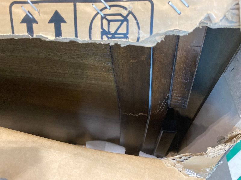 Photo 1 of **USED*Signature Design by Ashley Taffenbrook Farmhouse 10-Drawer Bedroom Dresser with Felt-Lined Top Drawer for Jewelry and Delicates, Easy Glide Drawers, Picture Frame Moulding, Black Handles, Dark Brown