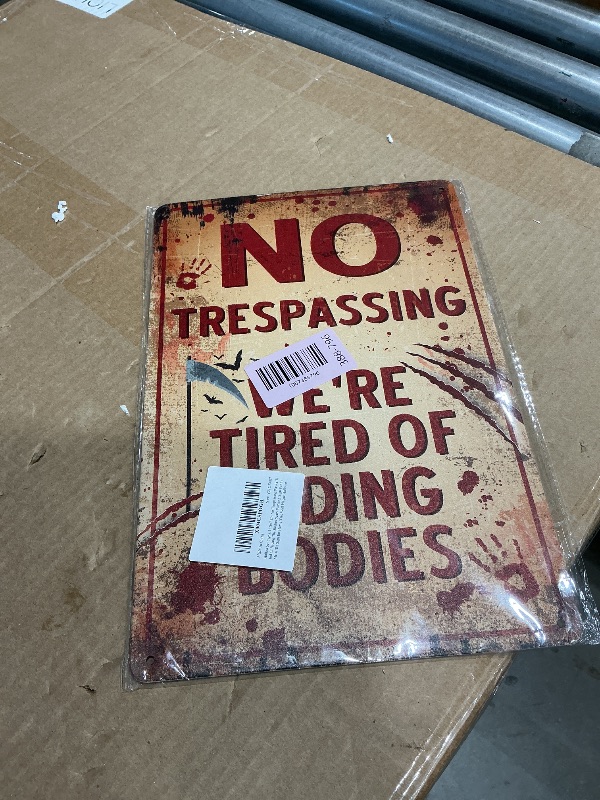 Photo 1 of **MAJOR DAMAGE**
Halloween Signs, 11.8x7.8In No Trespassing We'Re Tired Of Hiding The Bodies Scary Warning Sign Funny Metal Tin Sign for Home Yard Wall Plaque Halloween Party Decorations Haunted House Props