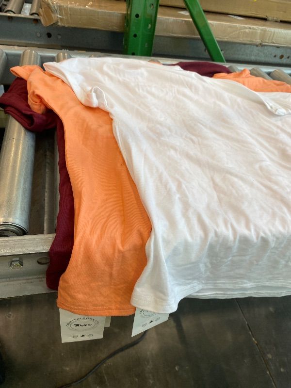 Photo 1 of **VIEW CLERK COMMENTS**
3 Pack Women's Oversized T-Shirt Half Sleeve Summer Tees Casual Loose Fit Crew Neck Basic Tops(BURGUNDY, WHITE, PEACH ,Medium)