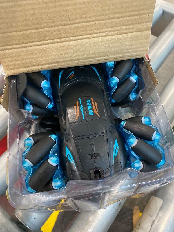 Photo 1 of **UNTESTED**
Jovow RC Stunt Car, 2.4GHz 4WD Gesture Sensing Remote Control Car with Cool Light and Music, Double-Sided 360° Flips RC Cars for Boys Age 6-12 8-12 Birthday Christmas Toy Cars(Blue)