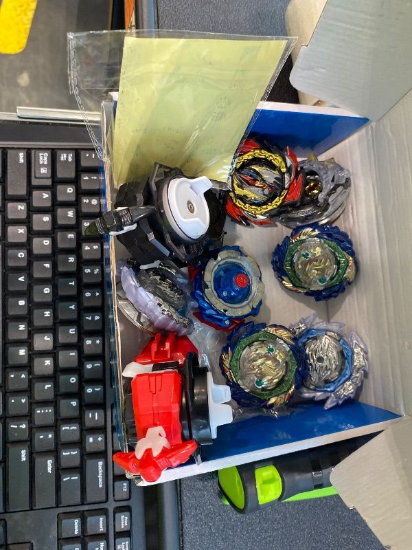 Photo 1 of ***MISSING PIECE*** MUSTYBELT Battling Top Burst Gyro Toy Set Toy Gift for Children Boys Ages 6 8 10 12+ Combat Battling Game 12 Burst Spinning Tops 2 Two Way Launchers Grip Starter (BOZE-B8)