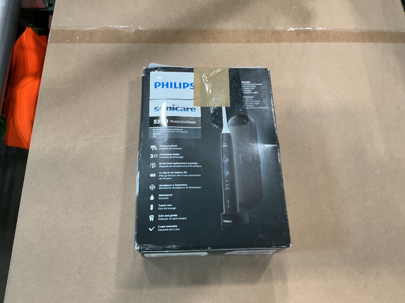 Photo 1 of **MAJOR DAMAGE - USED**
Philips Sonicare ProtectiveClean 5300 Rechargeable Electric Toothbrush, with Pressure Sensor, 3 Cleaning Modes, SmarTimer and QuadPacer, with 2 Bonus Brush Heads, Travel Case, Black, Model HX6423/34
