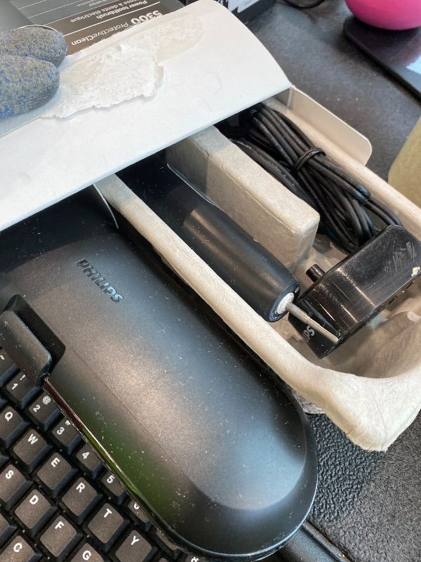 Photo 1 of **MAJOR DAMAGE - USED**
Philips Sonicare ProtectiveClean 5300 Rechargeable Electric Toothbrush, with Pressure Sensor, 3 Cleaning Modes, SmarTimer and QuadPacer, with 2 Bonus Brush Heads, Travel Case, Black, Model HX6423/34