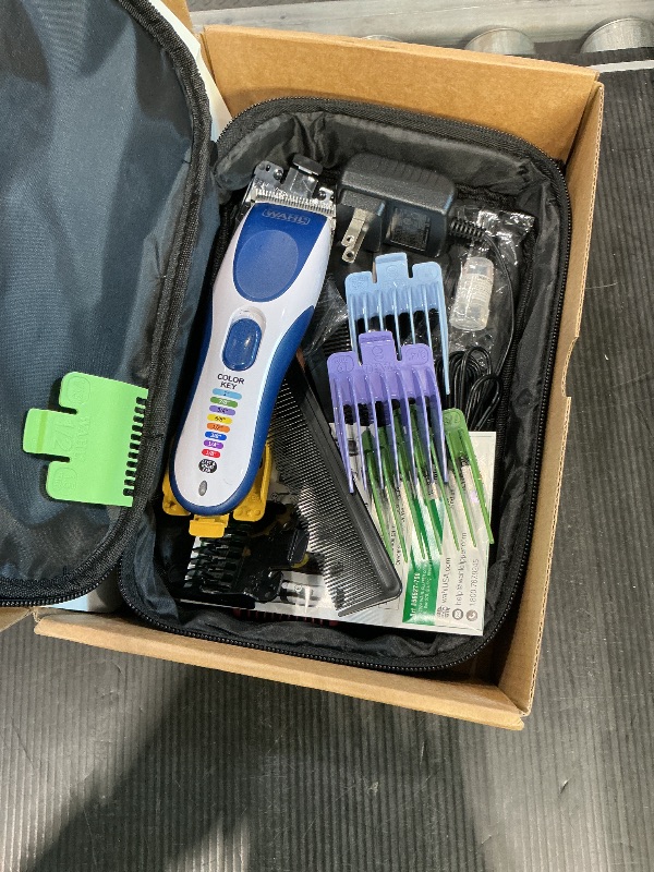 Photo 1 of *** SEE CLERK COMMENTS*** Wahl Color Pro Cordless Rechargeable Hair Clipper & Trimmer – Easy Color-Coded Guide Combs - for Men, Women, & Children – Model 9649P