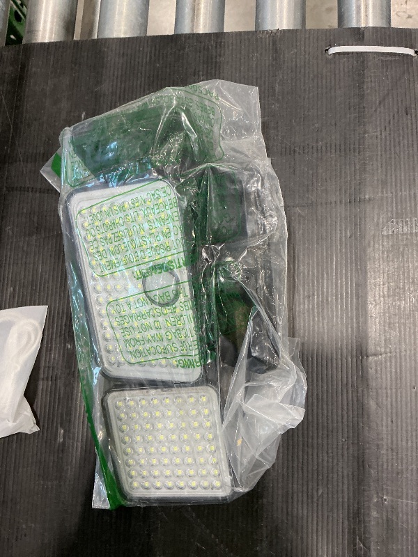 Photo 1 of ***MISSING PIECES*** ***READ CLERK NOTES*** JACKYLED Solar Lights Outdoor, 4000mAh Security Lights with Larger Solar Panel & 16.4FT Cable, 4-Head Motion Sensor Lights with Remote Control, IP65 Waterproof 270° Wide Flood Wall Lights (2 Packs)